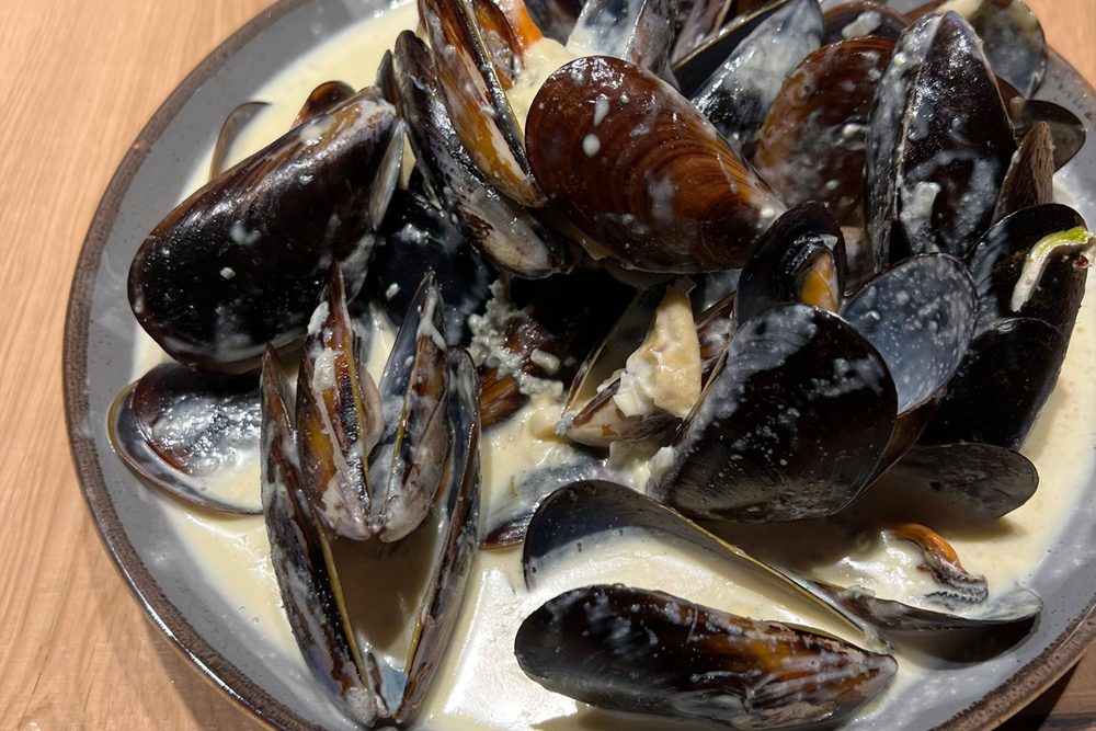 Muscheln in cremiger Käsesauce